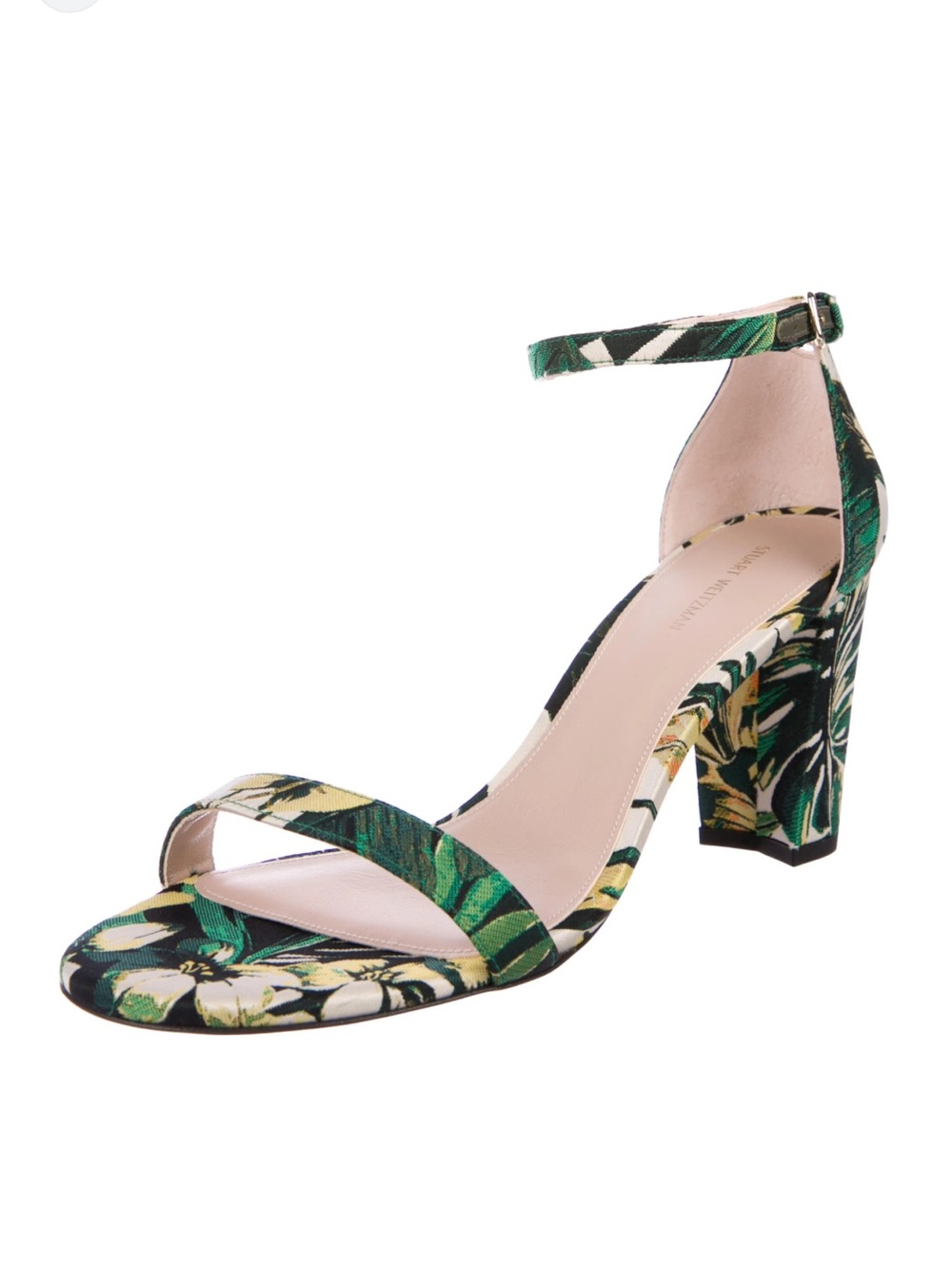 Stuart Weitzman NearlyNude sandals with an ankle strap.